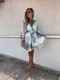 Robe longue à imprimé, col en V et taille cintrée